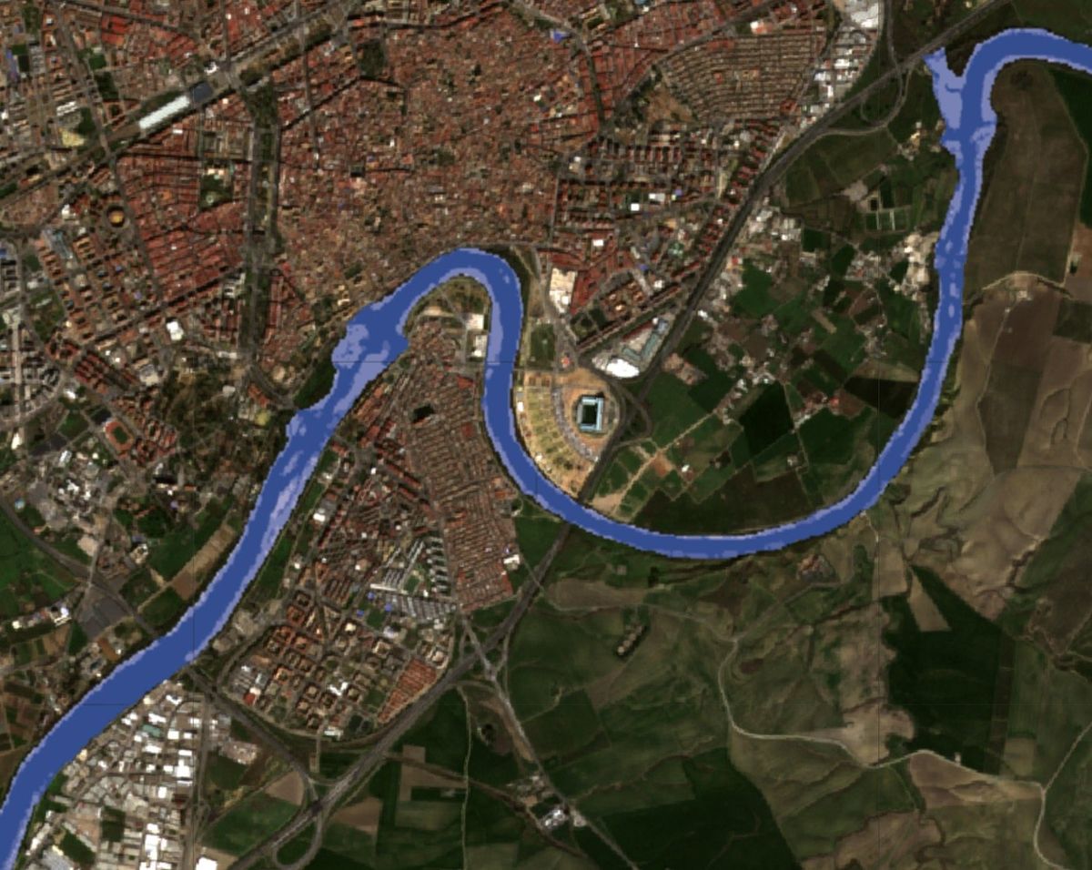 Satellite image of the Guadalquivir with the detected water surface marked in blue
